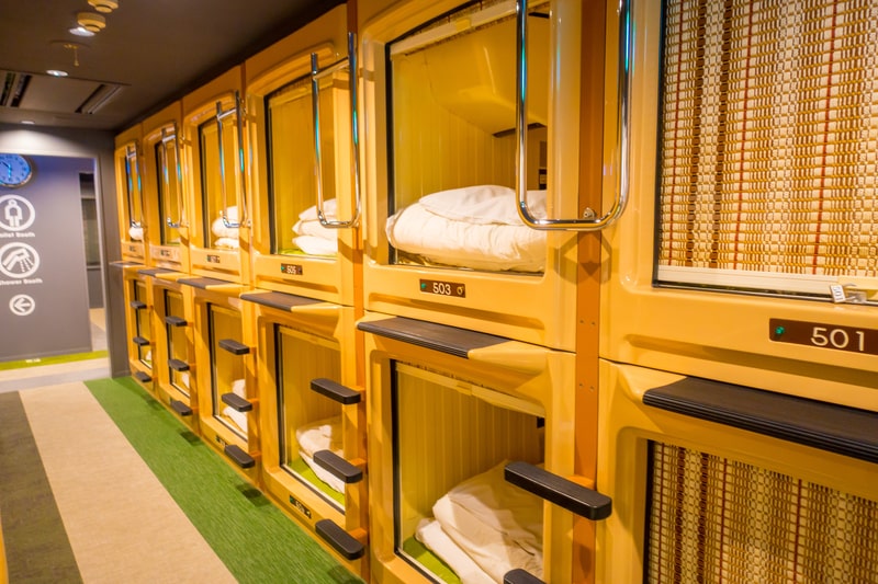 Japan Youth Travel enjoys a unique stay at a Capsule Hotel, experiencing futuristic Japanese accommodation.